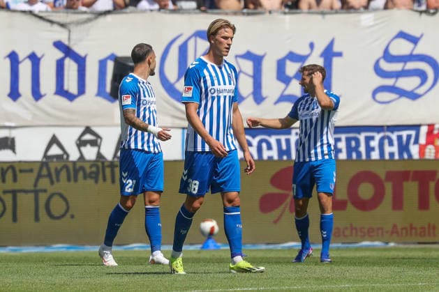 August 8, 2026, xgox, Soccer 2. Bundesliga 1 FC Magdeburg vs. Eintracht Braunschweig emspor, from left: Falko Michel (Magdeburg), 21, Luka Hyrylainen (Magdeburg), 38, Alexander Nollenberger (Magdeburg), 17, looks disappointed, looks dejected, looks downcast, disappointed. DFL and DFB regulations prohibit any use of photographs as image sequences and or quasi-video. Magdeburg