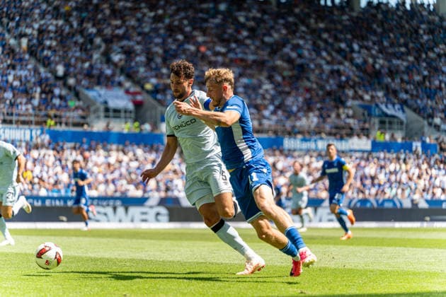August 8, 2026, xdaymx, Soccer 2. Bundesliga, Karlsruher SC vs. Arminia Bielefeld, vl Bauer, Maximilian Bielefeld in a tackle with Eichinger, Noel Karlsruhe DFL DFB REGULATIONS PROHIBIT ANY USE OF PHOTOGRAPHS AS IMAGE SEQUENCES AND OR QUASI-VIDEO Karlsruhe