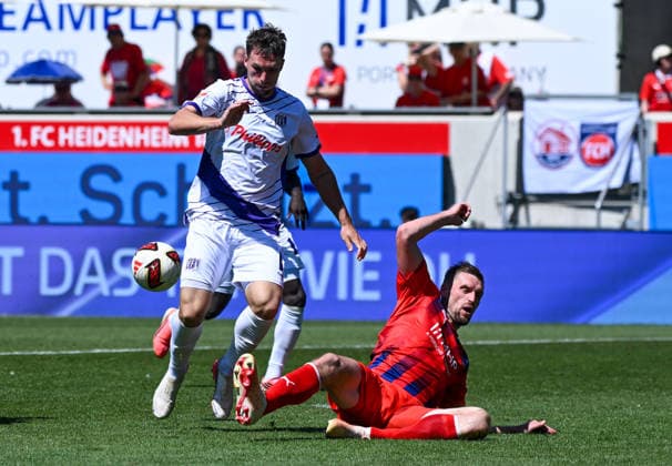 August 8, 2026, xemx, Soccer, 2. Bundesliga, 1. FC Heidenheim vs. VfL Osnabrück, Robin Meissner (VfL Osnabrück), Patrick Mainka, 1 FC Heidenheim, tackle, action, battle for the ball. DFL and DFB regulations prohibit any use of photographs as image sequences and or quasi-video. Heidenheim