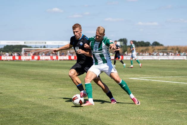 August 8, 2026, GER Germany, Soccer, 2026–2027 Season, Bundesliga, Friendly Match: Werder Bremen vs. SC Paderborn, Tackle between Marco Grüll (SV Werder Bremen, 17) and Laurin Curda (SC Paderborn 07, 17), Vechta Sports Complex, VfL Oythe, Lower Saxony, Germany Copyright: xnordphotoxGmbHx xSchulzex