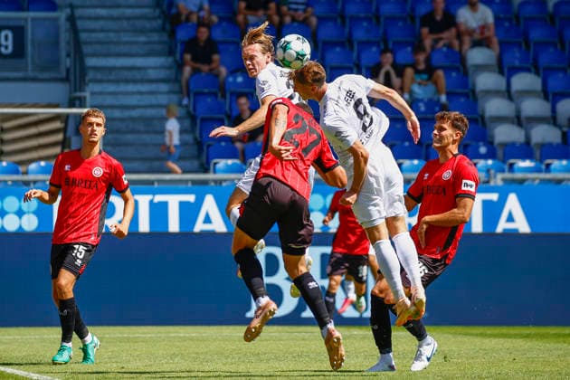 August 8, 2026, xavx, Soccer 3rd Division, SV Wehen Wiesbaden vs. Preußen Münster: Ryan Johansson (Preußen Münster), Jordy Gillekens (SV Wehen Wiesbaden), Joshua Mees of Preußen Münster in a header duel for the ball DFL DFB REGULATIONS PROHIBIT ANY USE OF PHOTOGRAPHS as IMAGE SEQUENCES and or QUASI-VIDEO Wiesbaden