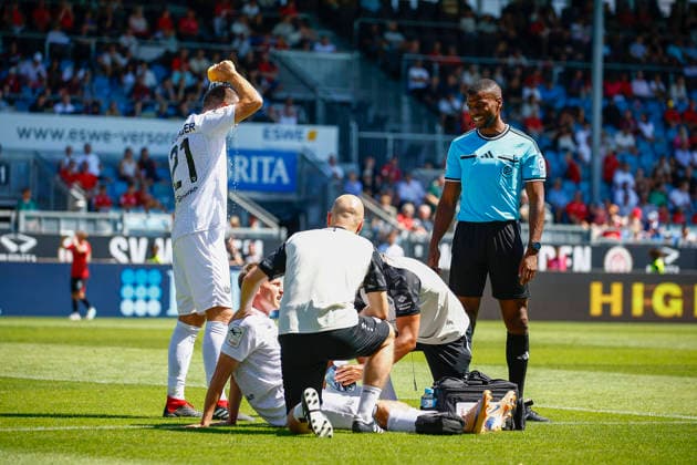 August 8, 2026, xavx, Soccer 3rd Division, SV Wehen Wiesbaden vs. Preußen Münster: Joshua Mees of Preußen Münster is treated on the field and substituted shortly thereafter for Rico Preißinger of Preußen Münster, Referee Assad Nouhoum. DFL and DFB regulations prohibit any use of photographs as image sequences and or quasi-video. Wiesbaden