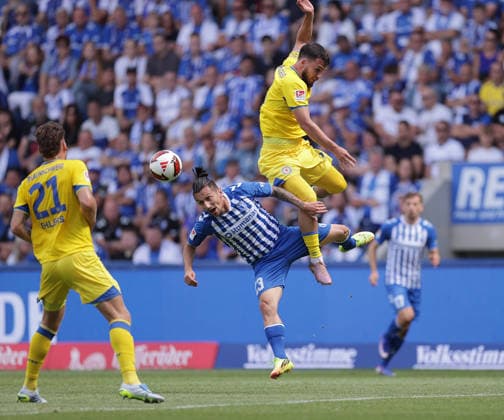 Mehmet Aydin, Eintracht Braunschweig; Baris Atik, 1 FC Magdeburg; Soccer, Men s, 2026–2027 Season, 2. Bundesliga, Avnet Arena, Matchday 1, 1 FC Magdeburg vs. Eintracht Braunschweig. DFL regulations prohibit any use of photographs as image sequences and or quasi-video.