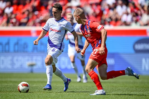 Konrad Faber of VfL Osnabrück and Adrian Beck of 1 FC Heidenheim 1846 go head-to-head during the 2. Bundesliga match between 1 FC Heidenheim and VfL Osnabrück, at the Voith Arena on August 8, 2026, in Heidenheim an der Brenz, Germany. Photo by Harry Langer, DeFodi Images. Konrad Faber of VfL Osnabrück and Adrian Beck of 1 FC Heidenheim 1846 battle for the ball during the 2. Bundesliga match between 1 FC Heidenheim and VfL Osnabrück at Voith Arena on August 8, 2026 in Heidenheim an der Brenz, Germany. Photo by Harry Langer, DeFodi Images. DFB and DFL regulations prohibit any use of photographs as image sequences and or quasi-video. Photo by Harry Langer, DeFodi Images. DFB and DFL regulations prohibit any use of photographs as imSEQUENCES AND OR QUASI-VIDEO