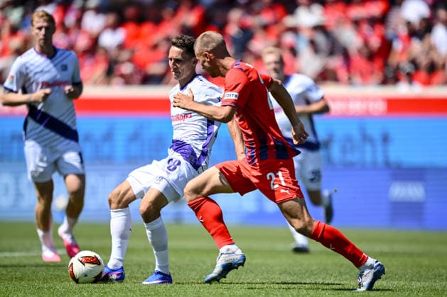 Konrad Faber of VfL Osnabrück and Adrian Beck of 1 FC Heidenheim 1846 go head-to-head during the 2. Bundesliga match between 1 FC Heidenheim and VfL Osnabrück, at the Voith Arena on August 8, 2026, in Heidenheim an der Brenz, Germany. Photo by Harry Langer, DeFodi Images. Konrad Faber of VfL Osnabrück and Adrian Beck of 1 FC Heidenheim 1846 battle for the ball during the 2. Bundesliga match between 1 FC Heidenheim and VfL Osnabrück at Voith Arena on August 8, 2026 in Heidenheim an der Brenz, Germany. Photo by Harry Langer, DeFodi Images. DFB and DFL regulations prohibit any use of photographs as image sequences and or quasi-video. Photo by Harry Langer, DeFodi Images. DFB and DFL regulations prohibit any use of photographs as imSEQUENCES AND OR QUASI-VIDEO