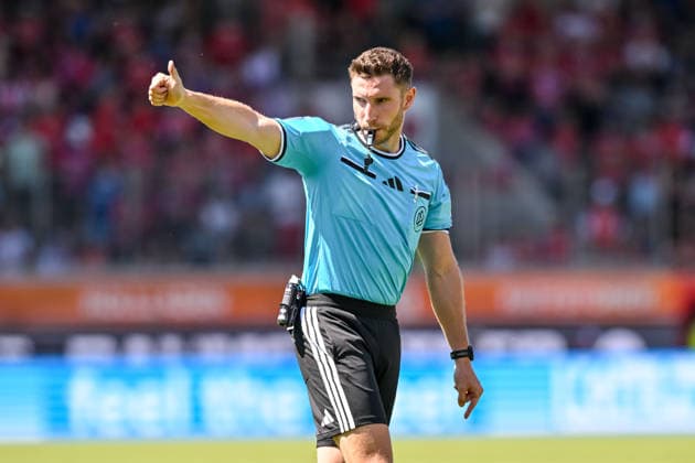 Referee Eric Weisbach gestures during the 2. Bundesliga match between 1. FC Heidenheim and VfL Osnabrück, at the Voith Arena on August 8, 2026, in Heidenheim an der Brenz, Germany. Photo by Harry Langer, DeFodi Images. Referee Eric Weisbach gestures during the 2nd Bundesliga match between 1 FC Heidenheim and VfL Osnabrück at the Voith Arena on August 8, 2026 in Heidenheim an der Brenz, Germany. Photo by Harry Langer, DeFodi Images. DFB and DFL regulations prohibit any use of photographs as image sequences and or quasi-video. Photo by Harry Langer, DeFodi Images. DFB and DFL regulations prohibit any use of photographs as imSEQUENCES AND OR QUASI-VIDEO