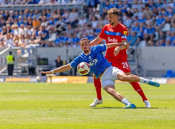 Game scene, tackle, action, ball action, from left: Lance Duijvestijn, SV Darmstadt 98, 41, Jonas Meffert, Holstein Kiel, 28, GER, SV Darmstadt 98 vs. Holstein Kiel, soccer, 2. Bundesliga, Matchday 1, 2026–2027 season, August 8, 2026, DFL regulations prohibit any use of photographs as image sequences and or quasi-video, GER, SV Darmstadt 98 vs. Holstein Kiel, soccer, 2. Bundesliga, Matchday 1, 2026–2027 season, August 8, 2026, Darmstadt Copyright: xEibner-Pressefoto J-NxGroemlingx EP_JGG