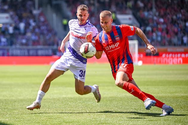Patrick Kammerbauer of VfL Osnabrück and Adrian Beck of 1 FC Heidenheim 1846 go head-to-head during the 2. Bundesliga match between 1 FC Heidenheim and VfL Osnabrück, at the Voith Arena on August 8, 2026, in Heidenheim an der Brenz, Germany. Photo by Harry Langer, DeFodi Images. Patrick Kammerbauer of VfL Osnabrück and Adrian Beck of 1 FC Heidenheim 1846 battle for the ball during the 2. Bundesliga match between 1 FC Heidenheim and VfL Osnabrück at Voith Arena on August 8, 2026 in Heidenheim an der Brenz, Germany. Photo by Harry Langer, DeFodi Images. DFB and DFL regulations prohibit any use of photographs as image sequences and or quasi-video. Photo by Harry Langer, DeFodi Images. DFB and DFL regulations prohibit any use of photographs as imSEQUENCES AND OR QUASI-VIDEO