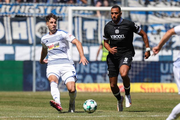August 8, 2026, xkwix, Soccer, 3rd Division, MSV Duisburg vs. SV Meppen, Schauinsland Reisen Arena, Matchday 1, 2026–2027 season: Tobias Fleckstein (MSV Duisburg 5) in a tackle against Cyrill Akono (SV Meppen 9). DFB regulations prohibit any use of photographs as image sequences and or quasi-video. Photo: xKamilxWilkowskixPressefotoKochx, North Rhine-Westphalia, Germany