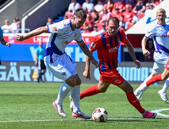 August 8, 2026, xemx, Soccer, 2. Bundesliga, 1. FC Heidenheim vs. VfL Osnabrück, Robin Meissner (VfL Osnabrück), Jonas Foehrenbach, 1 FC Heidenheim, tackle, action, battle for the ball. DFL and DFB regulations prohibit any use of photographs as image sequences and or quasi-video. Heidenheim