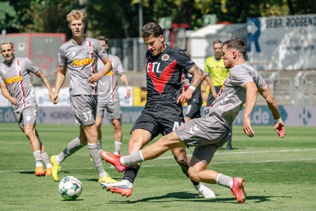 Tackle between Niklas Castelle of Viktoria Cologne, 44, and Oscar Schoenfelder of SSV Jahn Regensburg, 07; FC Viktoria Cologne vs. SSV Jahn Regensburg, Soccer, 3rd Division, Matchday 01, 2026–2027 Season, August 8, 2026 DFL and DFB regulations prohibit any use of photographs as image sequences and or quasi-video FC Viktoria Cologne vs. SSV Jahn Regensburg, soccer, 3rd Division, Matchday 1, 2026–2027 season, August 8, 2026, Cologne Copyright: xEibner-Pressefoto ThomasxHaeslerx EP_THR
