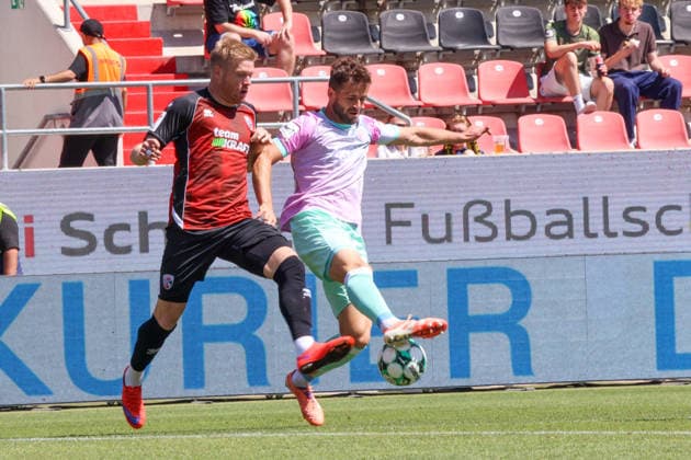 Tackle between Lars Lokotsch of FC Ingolstadt 04 (No. 13) and Daniel Haegele of Würzburger Kickers (No. 22) during the match between FC Ingolstadt 04 and Würzburger Kickers on August 8, 2026, DFB regulations prohibit any use of photographs as image sequences and or quasi-video. GER, Soccer, 3. Liga, Matchday 1, FC Ingolstadt 04 vs. Würzburger Kickers, August 8, 2026, Audi Sportpark Ingolstadt Copyright: xEibner-Pressefoto OliverxSTRISCHx EP-OSH