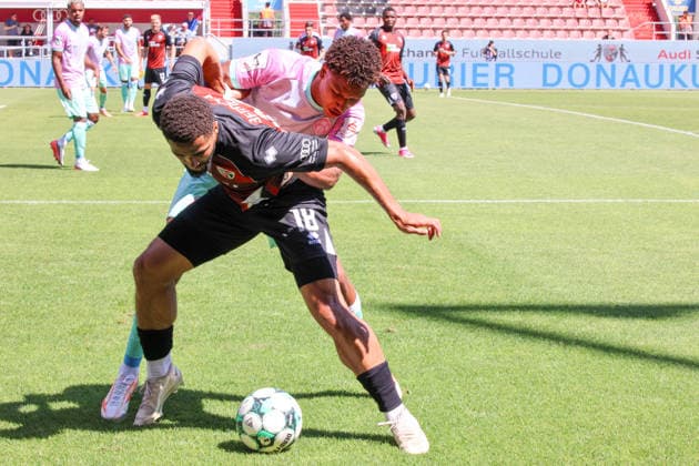 A tackle between Keanan Bennett of FC Ingolstadt 04 (No. 18) and Liam Omore of Würzburger Kickers (No. 17) during the match between FC Ingolstadt 04 and Würzburger Kickers on August 8, 2026, DFB regulations prohibit any use of photographs as image sequences and or quasi-video. GER, Soccer, 3. Liga, Matchday 1, FC Ingolstadt 04 vs. Wuerzburger Kickers, August 8, 2026, Audi Sportpark Ingolstadt Copyright: xEibner-Pressefoto OliverxSTRISCHx EP-OSH