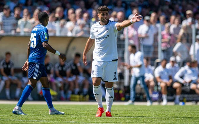 Soccer, 2026–2027 Season, Regionalliga West, August 8, 2026, Matchday 2, Men s, 1 FC Bocholt (white) vs. FC Schalke 04 U23 (blue) Malek Fakhro 1 FC Bocholt, Bocholt Stadion am Huenting, Germany 260808_fb_1fc-bocholt_schalke-04-u23_57490