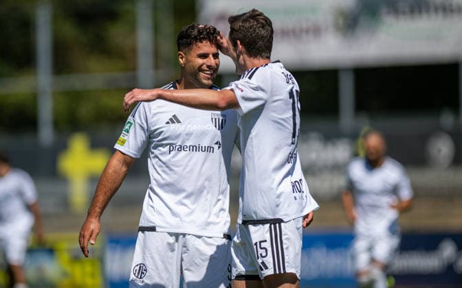 Soccer, 2026–2027 Season, Regionalliga West, August 8, 2026, Matchday 2, Men s, 1 FC Bocholt (white) vs. FC Schalke 04 U23 (blue) – Malek Fakhro (1 FC Bocholt), Lennar Garlipp (1 FC Bocholt), Bocholt Stadion am Huenting, Germany 260808_fb_1fc-bocholt_schalke-04-u23_57495