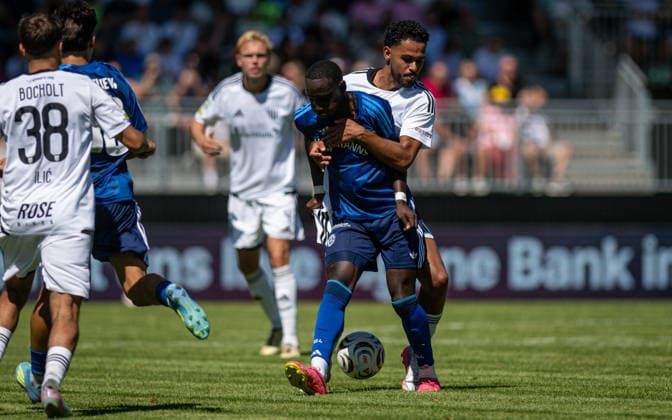 Soccer, 2026–2027 Season, Regionalliga West, August 8, 2026, Matchday 2, Men s, 1 FC Bocholt (white) vs. FC Schalke 04 U23 (blue) – Jean Paul Ndiaye (FC Schalke 04 U23), Elano Yegen (1 FC Bocholt), Bocholt Stadion am Huenting, Germany 260808_fb_1fc-bocholt_schalke-04-u23_57505
