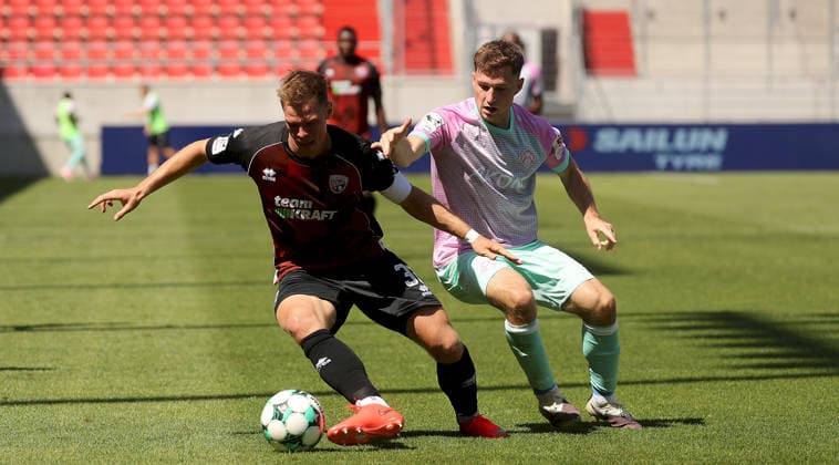 August 7, 2026, 3. Liga, FC Ingolstadt 04 vs. FC Würzburger Kickers; from left: Simon Lorenz (FC Ingolstadt 04), Tim Kraus (FC Würzburger Kickers); Ingolstadt, Audi Sportpark, Bavaria, Germany