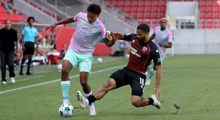 August 7, 2026, 3rd Division, FC Ingolstadt 04 vs. FC Würzburger Kickers; from left: Liam Omore (FC Würzburger Kickers), Keanan Bennets (FC Ingolstadt 04); Ingolstadt, Audi Sportpark, Bavaria, Germany