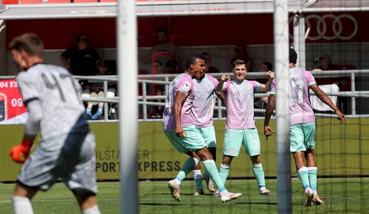 August 7, 2026, 3rd Division, FC Ingolstadt 04 vs. FC Würzburger Kickers, left: David Klein (FC Ingolstadt 04), FC Würzburger Kickers players celebrating a goal, goal celebration, Celebrating the 2–2 goal by Liam Omore, FC Würzburger Kickers, at Audi Sportpark in Ingolstadt, Bavaria, Germany