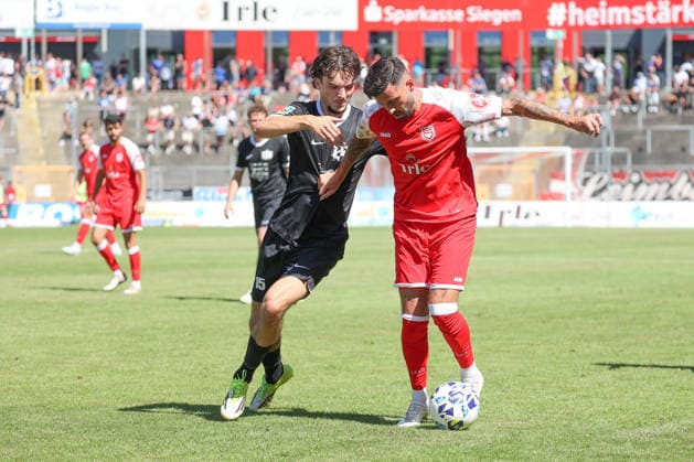 Armin Deljkovic (HIL) vs. Dennis Brock (SI) – Regional League West Soccer, Matchday 2, Sportfreunde Siegen vs. VfB 03 Hilden, on August 8, 2026, in Siegen, Germany