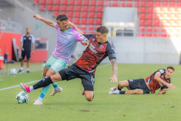 Ingolstadt, Germany, August 8, 2026, 3rd League 2026–2027, Matchday 1: FC Ingolstadt 04 vs. FC Würzburger Kickers. Pictured, second from left: Jonas Scholz (FCI) in a tackle. DFB and DFL regulations prohibit any use of photographs as image sequences and or quasi-video. Audi SportPark Bayern Copyright: xFotostandx xSchäferx