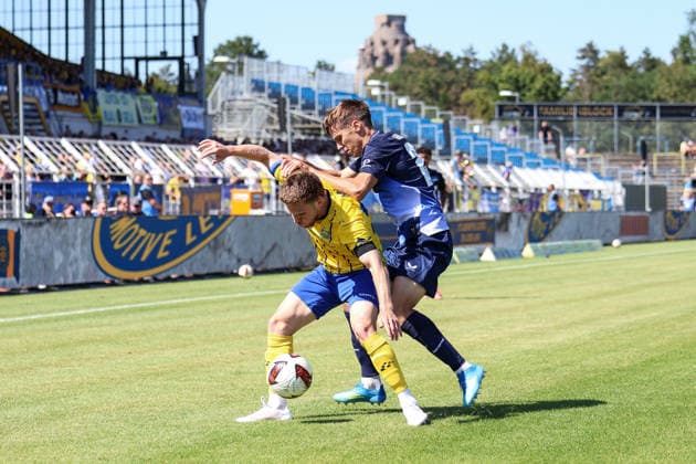 Germany Regionalliga Northeast 2026–2027, Matchday 4, 1 FC Lok Leipzig vs. Hertha BSC II, Bruno Plache Stadium, Leipzig: Dorian Äaevis Cevis (1 FC Lokomotive Leipzig, 22) and Filip Brekalo (Hertha BSC II, 20) in a tackle Copyright: xLucasxWalterx
