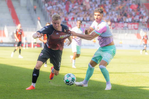 Ingolstadt, Germany, August 8, 2026, 3rd League 2026–2027, Matchday 1: FC Ingolstadt 04 vs. FC Würzburger Kickers. Pictured from left, in a tackle: Lars Lokotsch (FCI) and Ebrahim Farahnak (FWK). DFB and DFL regulations prohibit any use of photographs as image sequences and or quasi-video Audi Sportpark Bayern Copyright: xFotostandx xSchäferx