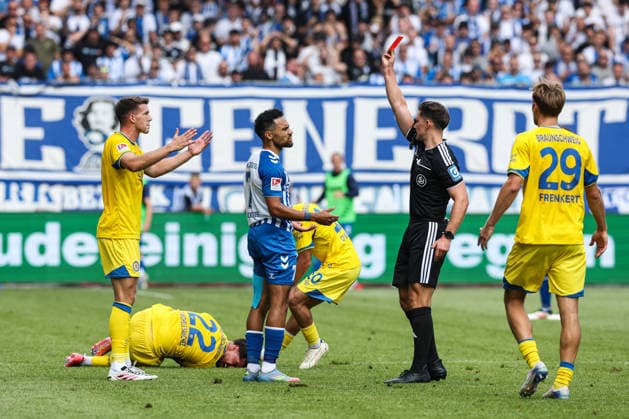 Herbert Bockhorn of 1. FC Magdeburg, No. 7, receives a red card during the 2026–2027 Bundesliga season match between 1. FC Magdeburg and Eintracht Braunschweig at the Avnet Arena in Magdeburg. Action, soccer, man,Men, Germany, August 8, 2026