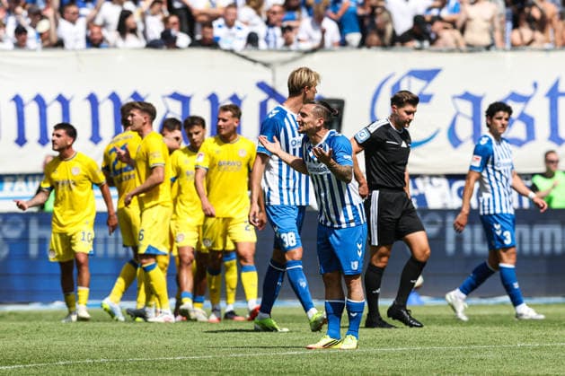 Baris Atik, 1. FC Magdeburg,23 Goal scorer Mehmet Aydin, Eintracht Braunschweig, scores on a penalty kick to make it 0–4 in the 2026–2027 Bundesliga season: 1 FC Magdeburg vs. Eintracht Braunschweig at the Avnet Arena in Magdeburg. Action, soccer, man,Men, Germany, August 8, 2026