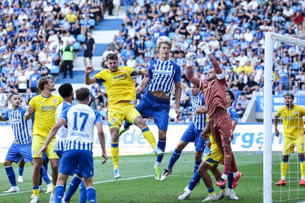 Luka Hyryläinen (1 FC Magdeburg, 38) and goalkeeper Dominik Reimann (1 FC Magdeburg, 1) against Kevin Ehlers (Eintracht Braunschweig),21 2 German Bundesliga 2026–2027 season 1 FC Magdeburg vs. Eintracht Braunschweig at the Avnet Arena in Magdeburg Action, Soccer, Man, Men, Germany, August 8, 2026