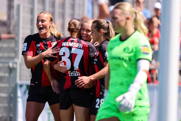 Leverkusen, Germany, August 8, 2026 Season opener: Friendly match between Bayer Leverkusen Women and Feyenoord Rotterdam Women. Pictured: Goal scorer Cornelia Kramer of Leverkusen, center, scores the 1–0 goal for Leverkusen and celebrates with her teammates. Copyright: HMBxMedia MadeleinexFantini