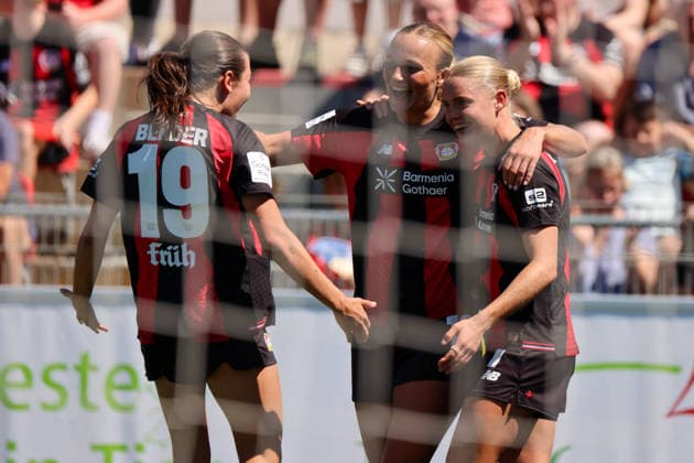 Leverkusen, Germany, August 8, 2026 Season Opener Friendly Match: Bayer Leverkusen Women vs. Feyenoord Rotterdam Women Pictured from left: Third goal scorer Cornelia Kramer of Leverkusen scores the goal to make it 2–0 for Leverkusen and celebrates with Loreen Bender of Leverkusen and Lobke Loonen of Leverkusen Copyright: HMBxMedia MadeleinexFantini