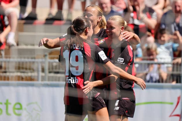 Leverkusen, Germany, August 8, 2026 Season Opener Friendly Match: Bayer Leverkusen Women vs. Feyenoord Rotterdam Women Pictured from left: Third goal scorer Cornelia Kramer of Leverkusen scores the goal to make it 2–0 for Leverkusen and celebrates with Loreen Bender of Leverkusen and Lobke Loonen of Leverkusen Copyright: HMBxMedia MadeleinexFantini