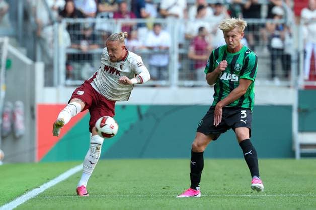 One-on-one, Action, featuring Marius Wolf (27, FC Augsburg) and Thomas Josh Doig (3, US Sassuolo Calcio), FC Augsburg vs. US Sassuolo Calcio, Soccer, Bundesliga 1, Friendly Match, 2026–27 Season, August 8, 2026, Augsburg, Bavaria, Germany Copyright: xkolbert-press ChristianxKolbertx