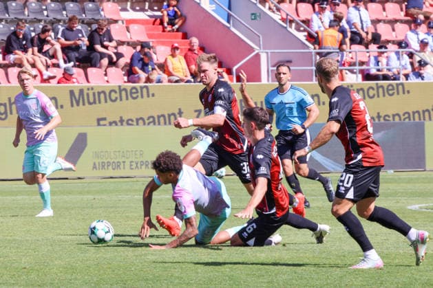 In a non-critical situation, Simon Lorenz of FC Ingolstadt 04, No. 32, and Georgios Antzoulas of FC Ingolstadt 04, No. 6, Namrud Embaye of Würzburger Kickers, No. 6, during the match between FC Ingolstadt 04 and Würzburger Kickers on August 8, 2026, DFB regulations prohibit any use of photographs as image sequences and or quasi-video. GER, Soccer, 3. Liga, Matchday 1, FC Ingolstadt 04 vs. Würzburger Kickers, August 8, 2026, Audi Sportpark Ingolstadt Copyright: xEibner-Pressefoto OliverxSTRISCHx EP-OSH