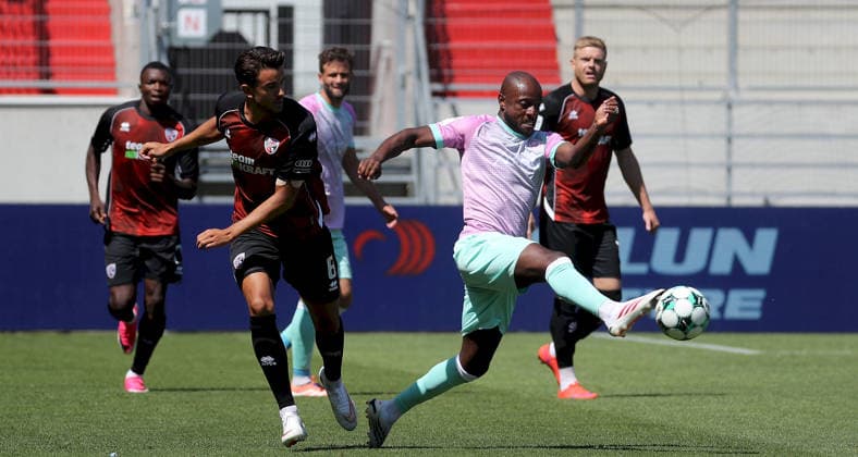 August 7, 2026, 3rd Division, FC Ingolstadt 04 vs. FC Würzburger Kickers; from left: Frederik Carlsen (FC Ingolstadt 04), David Kinsombi (FC Würzburger Kickers); Ingolstadt, Audi Sportpark, Bavaria, Germany