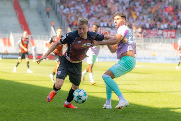 Ingolstadt, Germany, August 8, 2026, 3rd League 2026–2027, Matchday 1: FC Ingolstadt 04 vs. FC Würzburger Kickers. Pictured from left, in a tackle: Lars Lokotsch (FCI) and Ebrahim Farahnak (FWK). DFB and DFL regulations prohibit any use of photographs as image sequences and or quasi-video Audi Sportpark Bayern Copyright: xFotostandx xSchäferx