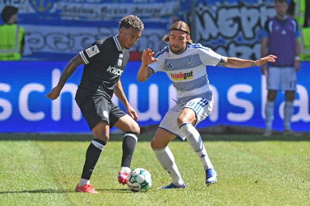 Oliver Issa Schmitt, SV Meppen 1912, No. 7, in a tackle with Joshua Bitter, MSV Duisburg, No. 29, GER, MSV Duisburg vs. SV Meppen 1912, Soccer, 3. Liga, Matchday 1, 2026–2027 season, August 8, 2026 DFL DFB regulations prohibit any use of photographs as image sequences and or quasi-video GER, MSV Duisburg vs. SV Meppen 1912, soccer, 3. Liga, Matchday 1, 2026–2027 season, August 8, 2026, Duisburg Copyright: xEibner-Pressefoto ThomasxThienelx EP_TTL
