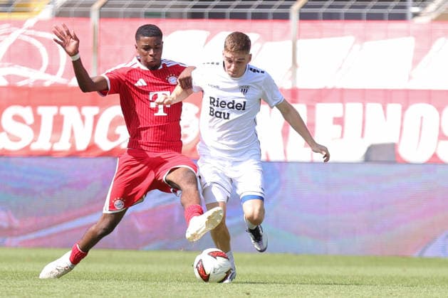 August 8, 2026, Men s Soccer, 2026–2027 Season, Bavarian Regional League, Matchday 3: FC Bayern Munich II vs. FC Schweinfurt 05. From left: Allen Junior Lambe (FC Bayern Munich II) vs. Philipp Hack (FC Schweinfurt 05), 07 Munich, Städtisches Stadion an der Grü, Bavaria, Germany