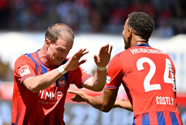 Goal celebration for an alleged 2-0 goal by Budu Zivzivadze Siwsiwadse; 1 FC Heidenheim 1846 (FCH) 11 goal disallowed by VAR, Video Assistant Referee, video review, Video Assistant Referee Marcel Costly, 1 FC Heidenheim 1846 FCH 24, 1 FC Heidenheim 1846 FCH vs. VfL Osnabrück, August 8, 2026. DFL regulations prohibit any use of photOGRAPHS AS IMAGE SEQUENCES AND OR QUASI-VIDEO 1 FC Heidenheim 1846 FCH vs. VfL Osnabrück