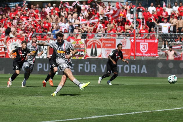 August 8, 2026, xsefx, Soccer, FC Viktoria Köln vs. SSV Jahn Regensburg, 3. Liga, Sportpark Höhenberg, Matchday 1, 2026–2027 Season: Adrian Fein of Jahn Regensburg takes a penalty kick. DFB regulations prohibit any use of photographs as image sequences and or quasi-video. North Rhine-Westphalia, Germany