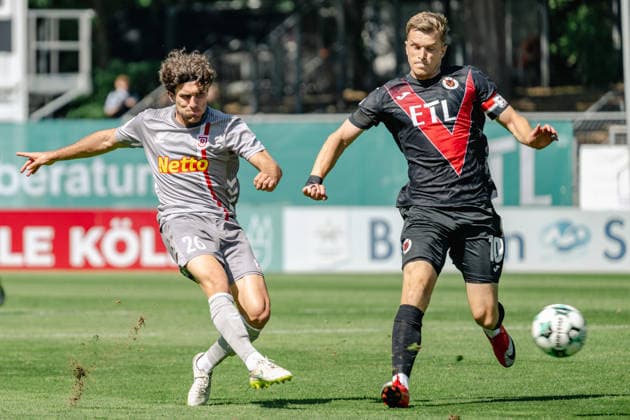 David Otto of Viktoria Cologne, No. 10, is unable to block the shot by Benedikt Bauer of SSV Jahn Regensburg, No. 26. FC Viktoria Cologne vs. SSV Jahn Regensburg, Soccer, 3rd Division, Matchday 1, 2026–2027 Season, August 8, 2026 DFL DFB regulations prohibit any use of photographs as image sequences and or quasi-video FC Viktoria Cologne vs. SSV Jahn Regensburg, Soccer, 3rd Division, Matchday 1, 2026–2027 season, August 8, 2026, Cologne Copyright: xEibner-Pressefoto ThomasxHaeslerx EP_THR