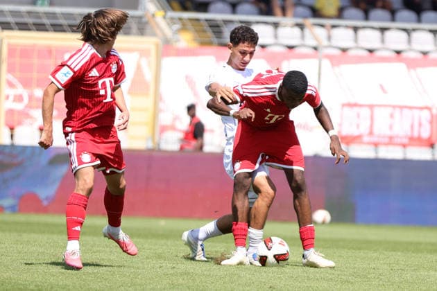 August 8, 2026, Men s, Soccer, 2026–2027 Season, Bavarian Regional League, Matchday 3: FC Bayern Munich II vs. FC Schweinfurt 05. From left: Mustafa Alper Özden (FC Schweinfurt 05), 20, against Allen Junior Lambe (FC Bayern Munich II), 08 Munich, Municipal Stadium an der Grü, Bavaria, Germany