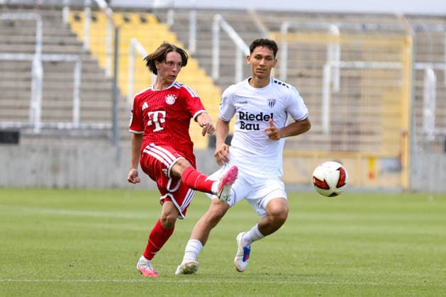 August 8, 2026, Men s Soccer, 2026–2027 Season, Bavarian Regional League, Matchday 3: FC Bayern Munich II vs. FC Schweinfurt 05. From left: Bohdan Olychenko (FC Bayern Munich II), 06, against Mustafa Alper Özden (FC Schweinfurt 05), 20. Munich, Municipal Stadium an der Grü, Bavaria, Germany