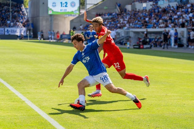 Game action, tackle, dribbling, offensive play, from left: Manolo Merx (SV Darmstadt 98, 48), Hiroki Sekine (Holstein Kiel, 32), GER, SV Darmstadt 98 vs. Holstein Kiel, soccer, 2. Bundesliga, Matchday 1, 2026–2027 season, August 8, 2026, DFL regulations prohibit any use of photographs as image sequences and or quasi-video, GER, SV Darmstadt 98 vs. Holstein Kiel, soccer, 2. Bundesliga, Matchday 1, 2026–2027 season, August 8, 2026, Darmstadt Copyright: xEibner-Pressefoto J-NxGroemlingx EP_JGG