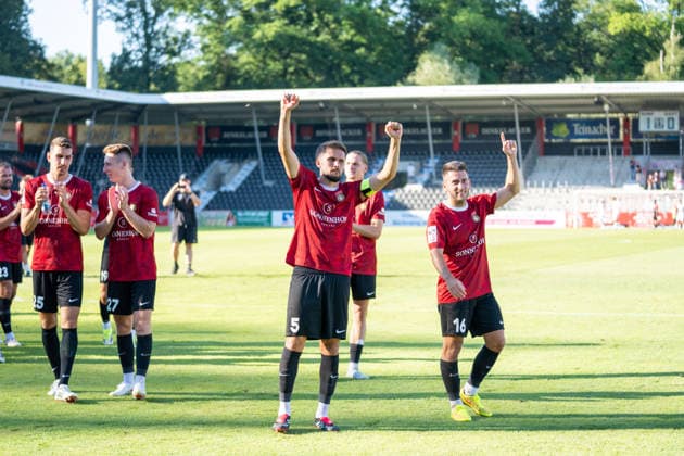 Volkan Celiktas of SG Sonnenhof Großaspach, 05, and Marius Kunde of SG Sonnenhof Großaspach, 16, celebrate the victory with the fans; SG Sonnenhof Großaspach vs. Fortuna Köln, soccer, 3rd Division, Matchday 1, August 8, 2026, DFB regulations prohibit any use of photographs as image sequences and or quasi-video. Aspach, Baden-Württemberg, Germany Copyright: xkolbert-press PhilipxZieglerx