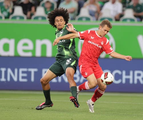 Mathys Angely, VfL Wolfsburg; Naatan Skyttae, 1. FC Kaiserslautern; Soccer, Men s, 2026–2027 Season, 2nd Division, Volkswagen Arena, VfL Wolfsburg vs. 1 FC Kaiserslautern DFL REGULATIONS PROHIBIT ANY USE OF PHOTOGRAPHS AS IMAGE SEQUENCES AND OR QUASI-VIDEO