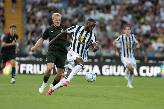 IPA87327962 - UDINESE S KEINAN DAVIS in action against Nottingham Forest s XAVER SCHLAGER during the FVG Cup match between Udinese Calcio and Nottingham Forest Football Club at the Bluenergy Stadium in Udine, Italy, on August 8, 2026.  Copyright: xMattiaxRadoni IPAxSportx xx 87327962