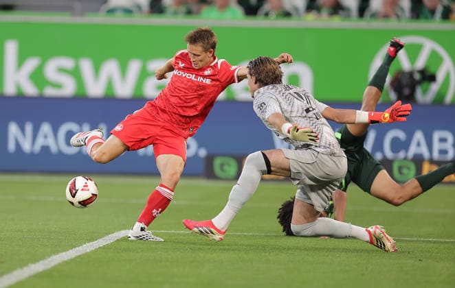 Mathys Angely, VfL Wolfsburg; Naatan Skyttae, 1. FC Kaiserslautern; Jakub Zielinski, VfL Wolfsburg; Soccer, Men s, 2026–2027 Season, 2. Bundesliga, Volkswagen Arena, VfL Wolfsburg vs. 1. FC Kaiserslautern. DFL regulations prohibit any use of photographs as image sequences and or quasi-video.