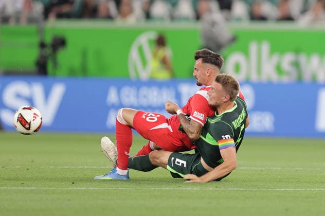 Mergim Berisha, 1. FC Kaiserslautern; Hauke Wahl, VfL Wolfsburg; Soccer, Men s, 2026–2027 Season, 2. Bundesliga, Volkswagen Arena, VfL Wolfsburg vs. 1 FC Kaiserslautern DFL REGULATIONS PROHIBIT ANY USE OF PHOTOGRAPHS AS IMAGE SEQUENCES AND OR QUASI-VIDEO